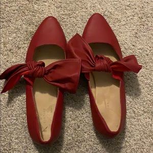 Red flats with bows